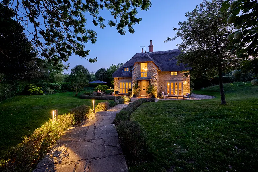 Dornywell Cottage Exterior At Night 2