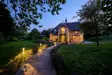Dornywell Cottage Exterior At Night 2