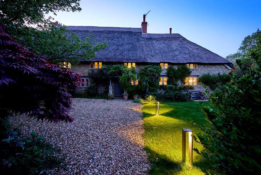 Dornywell Cottage Exterior At Night 1